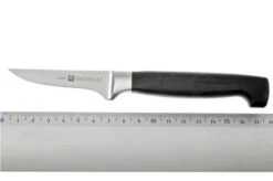 Zwilling J.A. Henckels Four Star Paring Knife 2 3/4" 9 Zwilling J.A. Henckels Four Star Paring Knife 2 3/4" -Kitchen Knife Store ZW31070 060 04 zwilling 4star 31070 060 groentemes d4